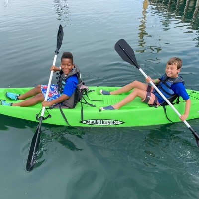 Two Kahuna campers kayaking at Channel Islands Harbor at Aloha Beach Camp