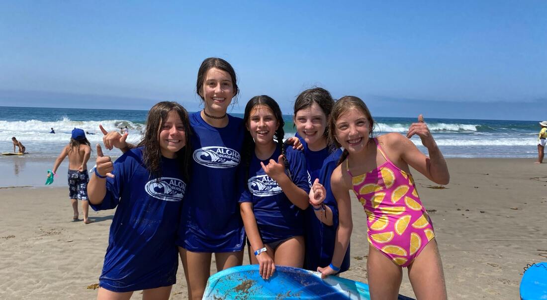 Nalu teens enjoying Aloha Beach Camp at Zuma Beach, Malibu