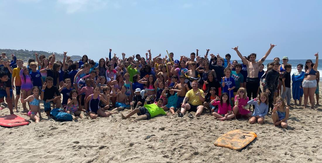 Our entire Kahuna Camp hanging out at Aloha Beach Camp at Zuma Beach