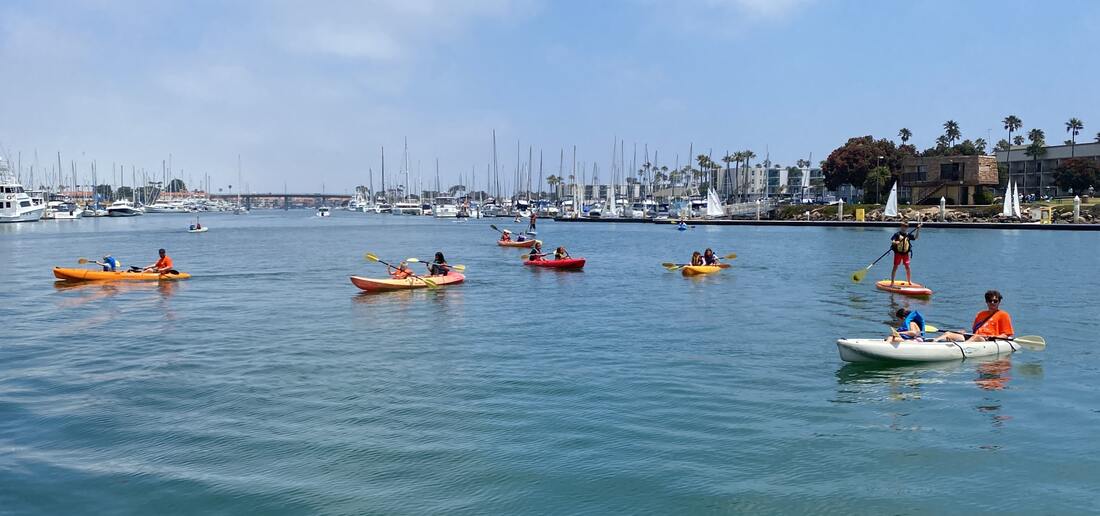 Westlake campers love Aloha Beach Camp and learning how to kayak and stand up paddle board!